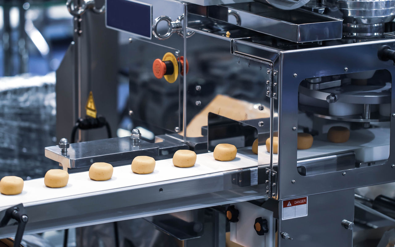 Dough divider and rounder dough ball machine; Shutterstock ID 2105547728; purchase_order: OPP Website & Media; job: ; client: ; other: 