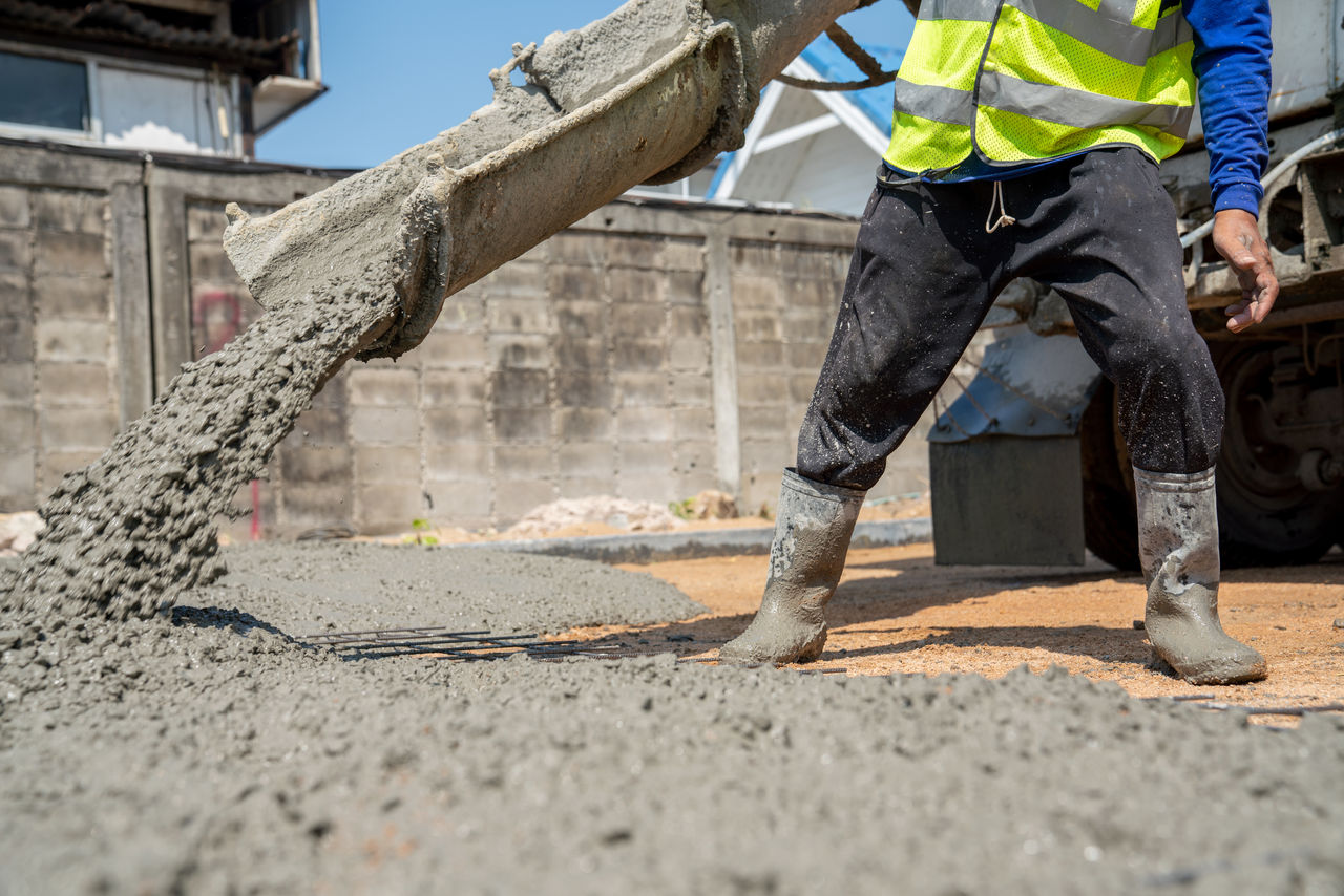 construction worker working with concrete